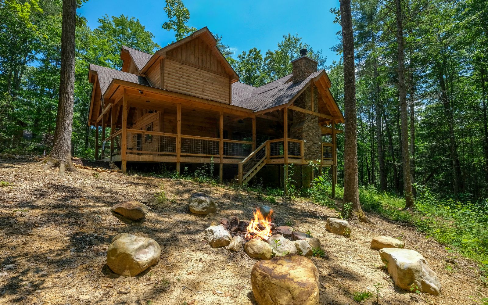 https://www.pigeonforgetncabins.com/wp-content/uploads/2022/02/pigeon-forge-cabin-majestic-timber-exterior-01.jpg